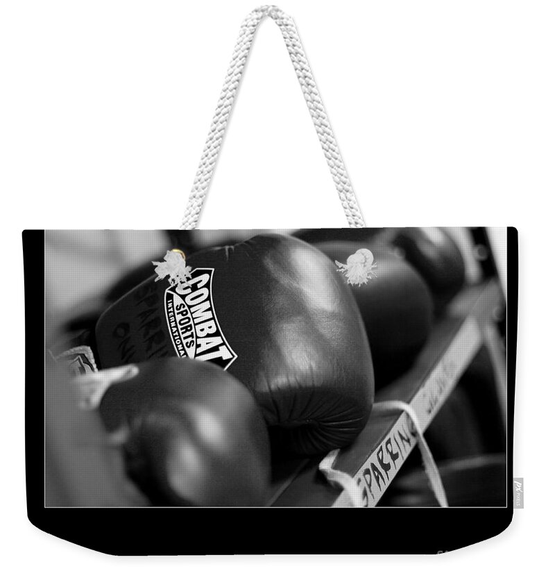  Weekender Tote Bag featuring the photograph The Only Easy Day Was Yesterday in Black and White by Angela Rath