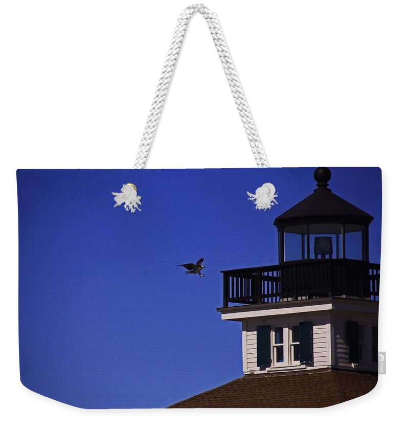 Boca Grande Lighthouse Weekender Tote Bag featuring the photograph The Osprey and the Lighthouse I by Michiale Schneider