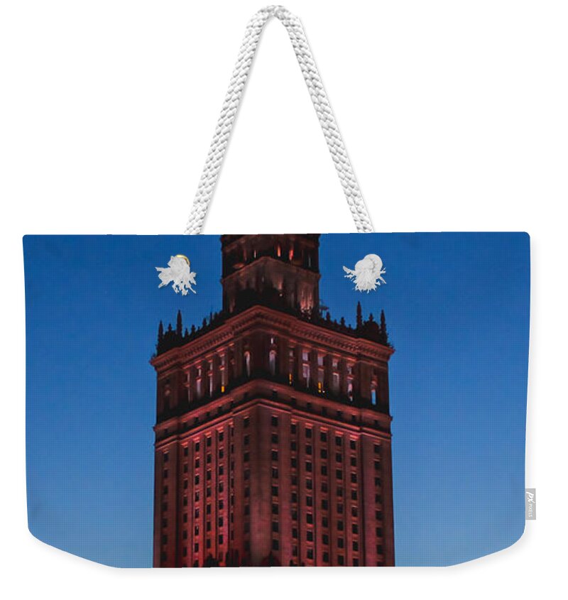 Palace Weekender Tote Bag featuring the photograph The Palace of Culture and Science by Iryna Liveoak