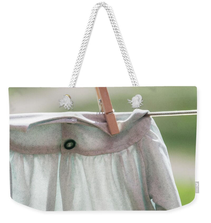 Clothespin Weekender Tote Bag featuring the photograph The Precious Gown by Jolynn Reed