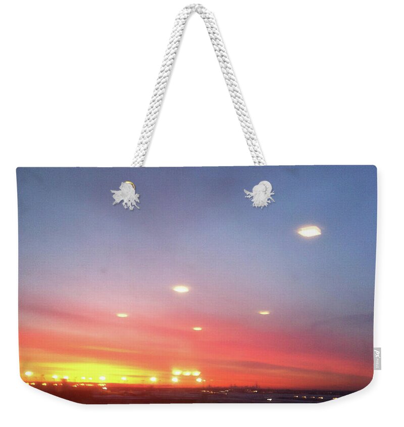Red Sky Weekender Tote Bag featuring the photograph The Red Glow of Sunset by Susan Grunin