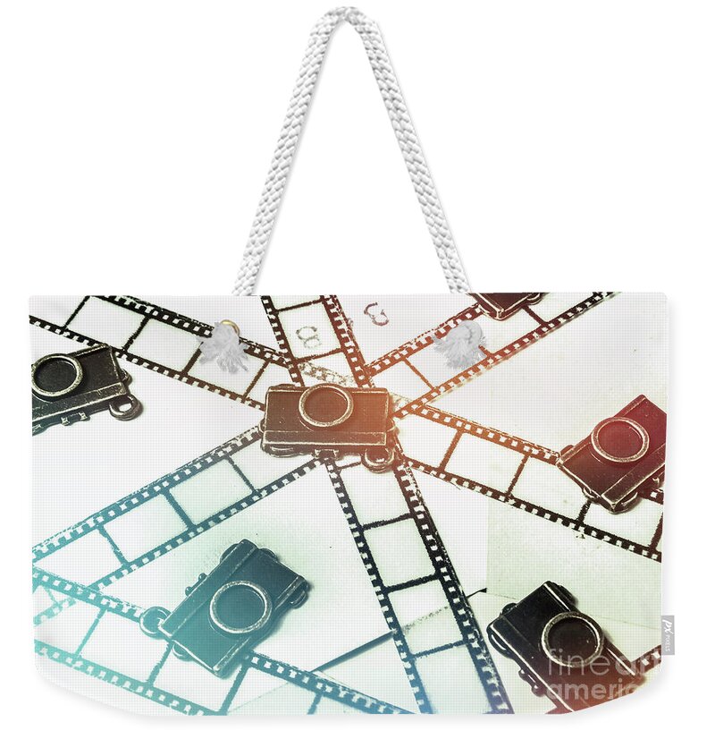 Design Weekender Tote Bag featuring the photograph The retro camera reel by Jorgo Photography