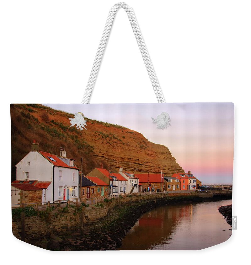 River Weekender Tote Bag featuring the photograph The River at Staithes by Jeff Townsend