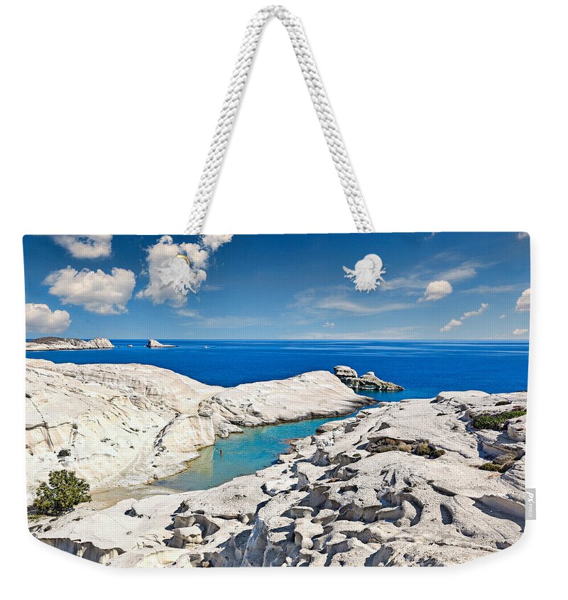 Milos Weekender Tote Bag featuring the photograph The Sarakiniko in Milos - Greece by Constantinos Iliopoulos
