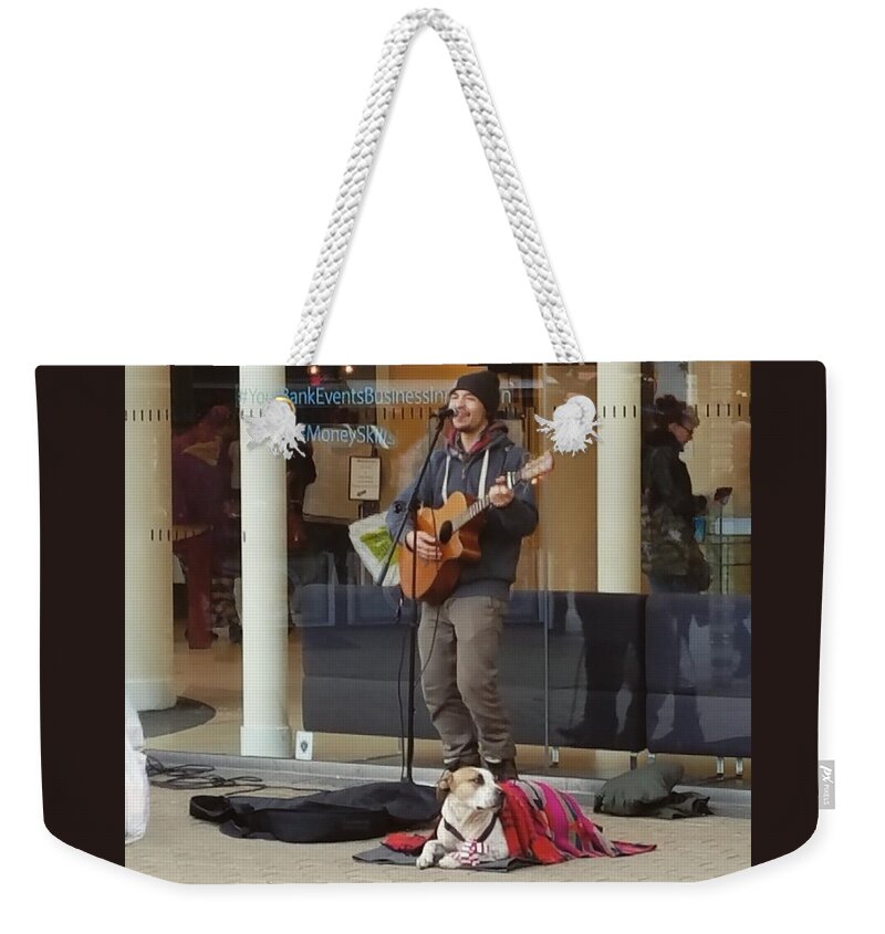 Singer Weekender Tote Bag featuring the photograph The Singer and His Dog by Vic Ritchey