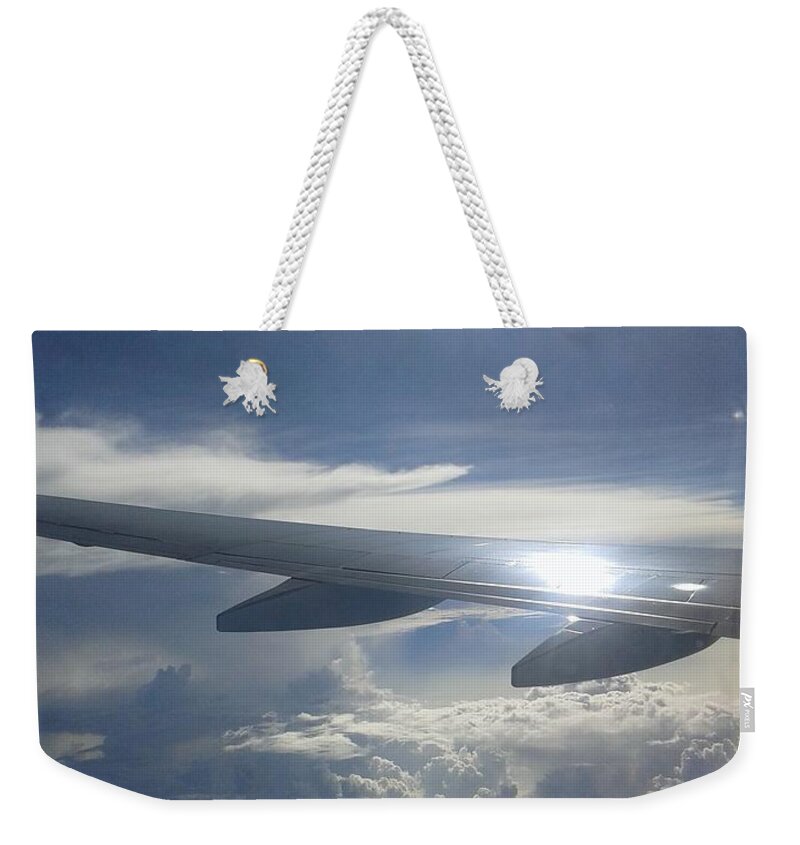Sky Weekender Tote Bag featuring the photograph The Sky from Plane by The Unique Shop