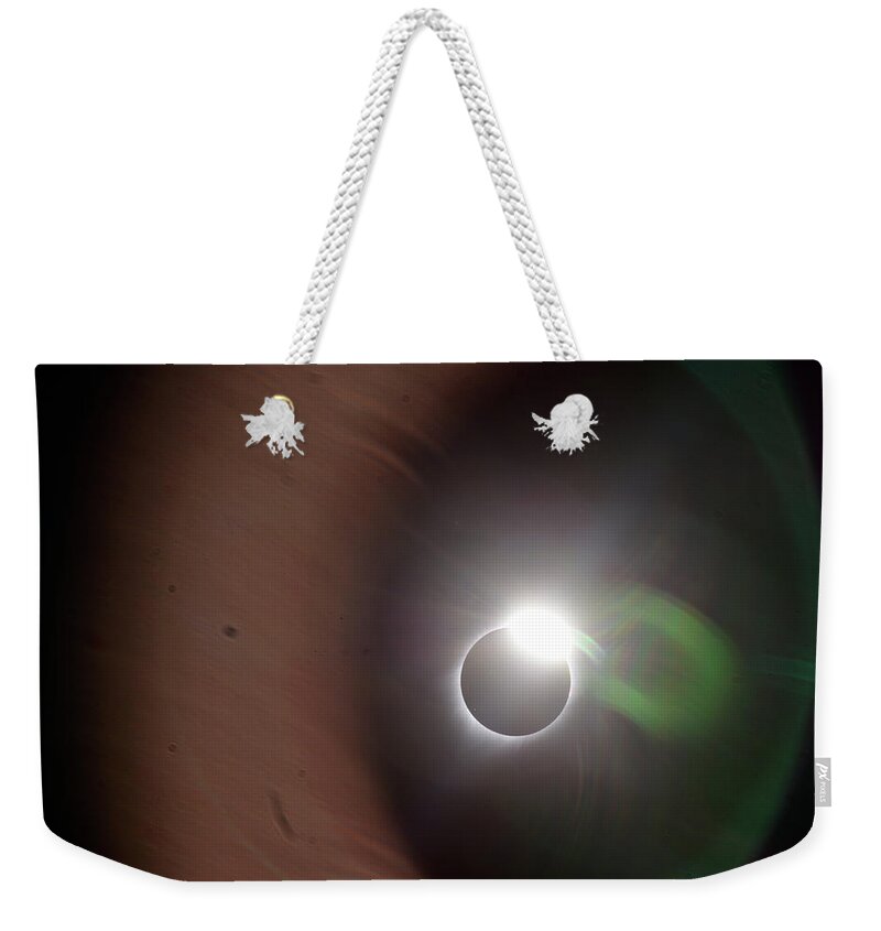 Eclipse Weekender Tote Bag featuring the photograph The Solar Iris of an Eclipse by Matt Swinden