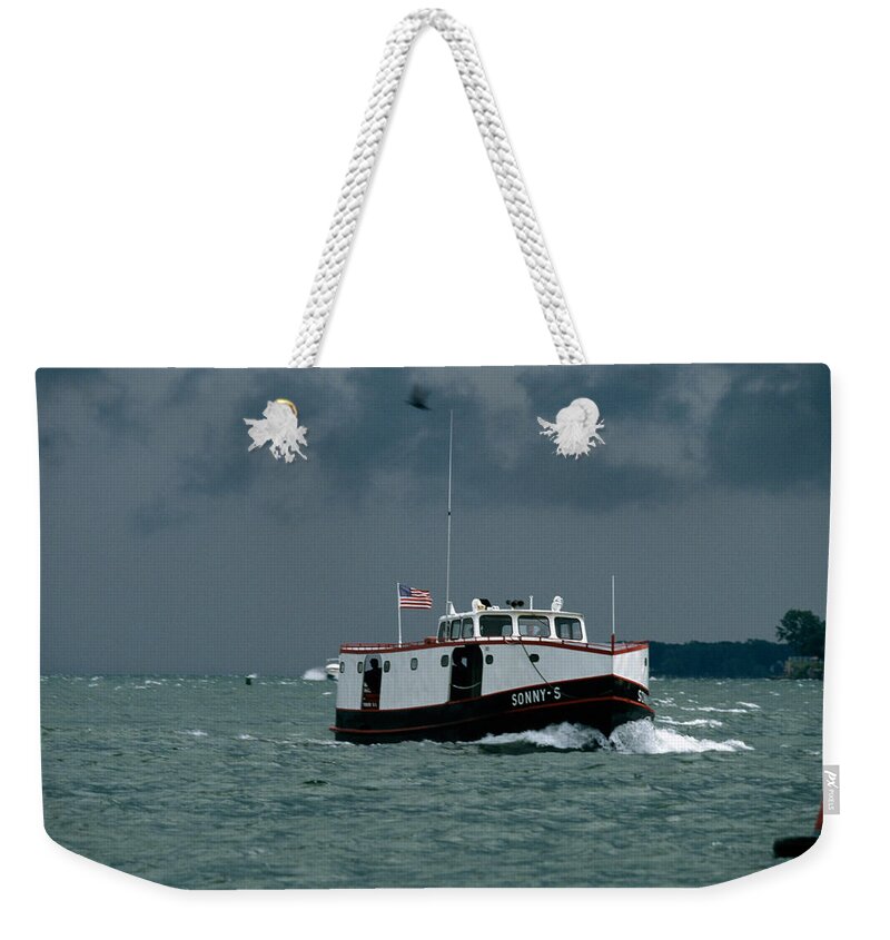 Ferry Weekender Tote Bag featuring the photograph The Sonny S Returning from Lonz Winery On Middle Bass Island by John Harmon