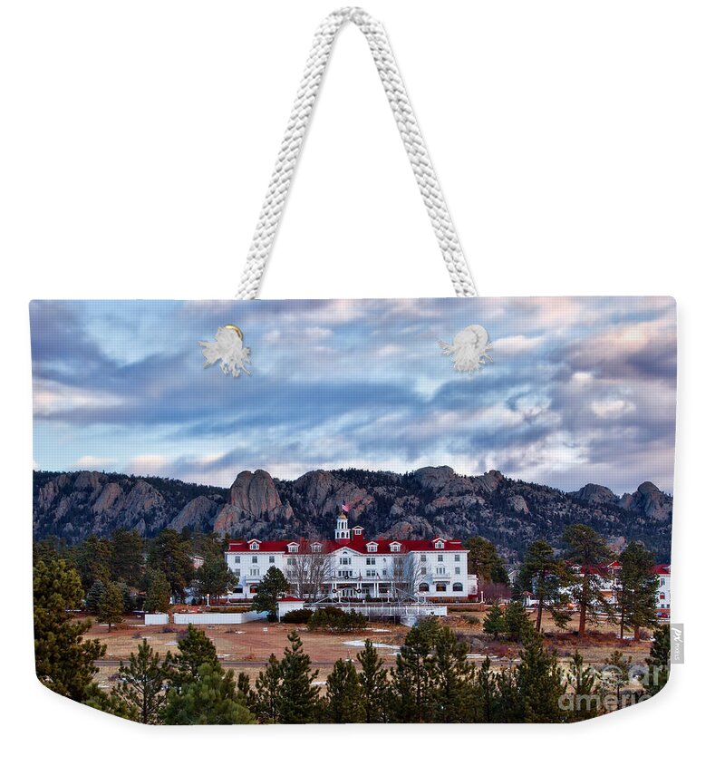 The Stanley Hotel Weekender Tote Bag featuring the photograph The Stanley Hotel by Ronda Kimbrow