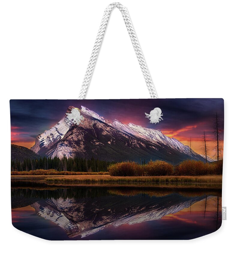 Mount Rundle Weekender Tote Bag featuring the photograph The Sun Also Rises by John Poon