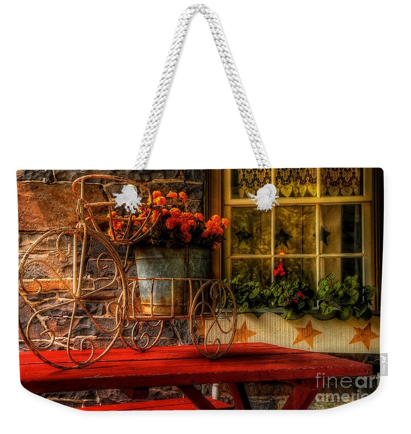 Tricycle Weekender Tote Bag featuring the photograph The Tricycle by Lois Bryan