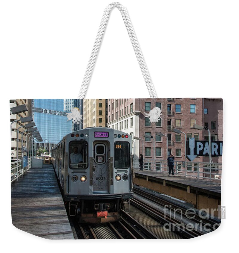 Chicago Weekender Tote Bag featuring the photograph The Wabash L Train at Eye Level by David Levin