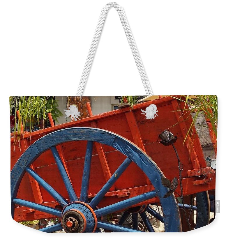 Wheel Weekender Tote Bag featuring the photograph The Wheel by Suzanne Theis