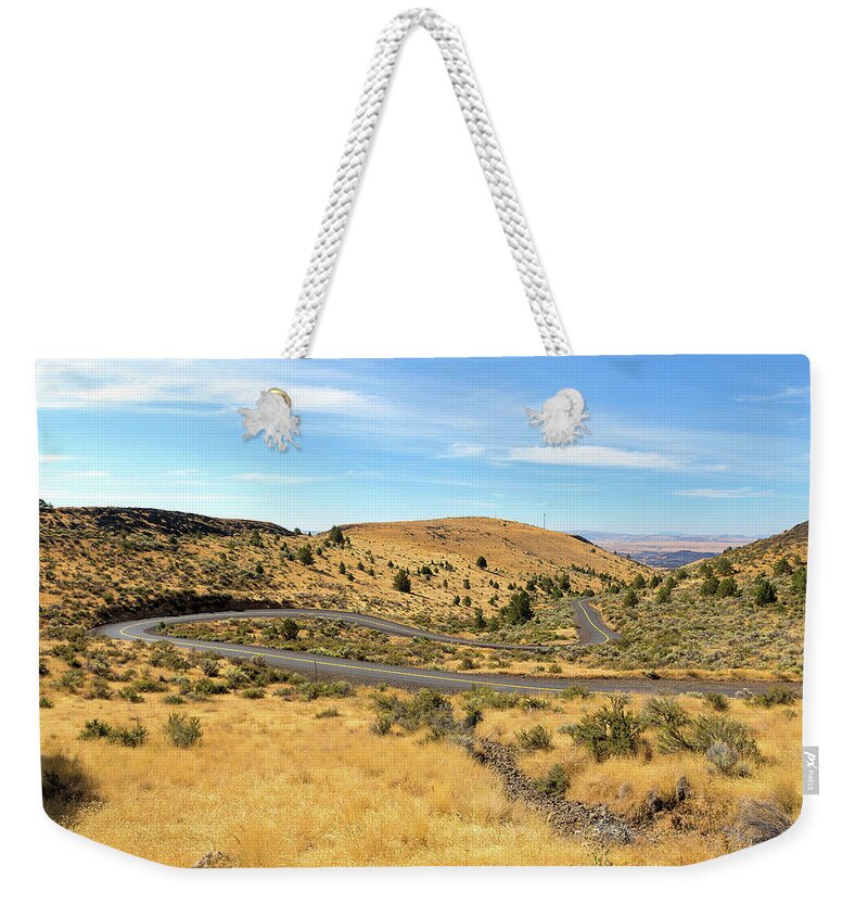 Road Weekender Tote Bag featuring the photograph The Winding Road in Central Oregon by David Gn