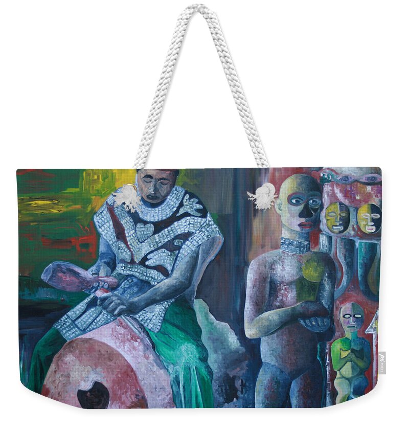 The Woodcarver Weekender Tote Bag featuring the painting The Woodcarver by Obi-Tabot Tabe