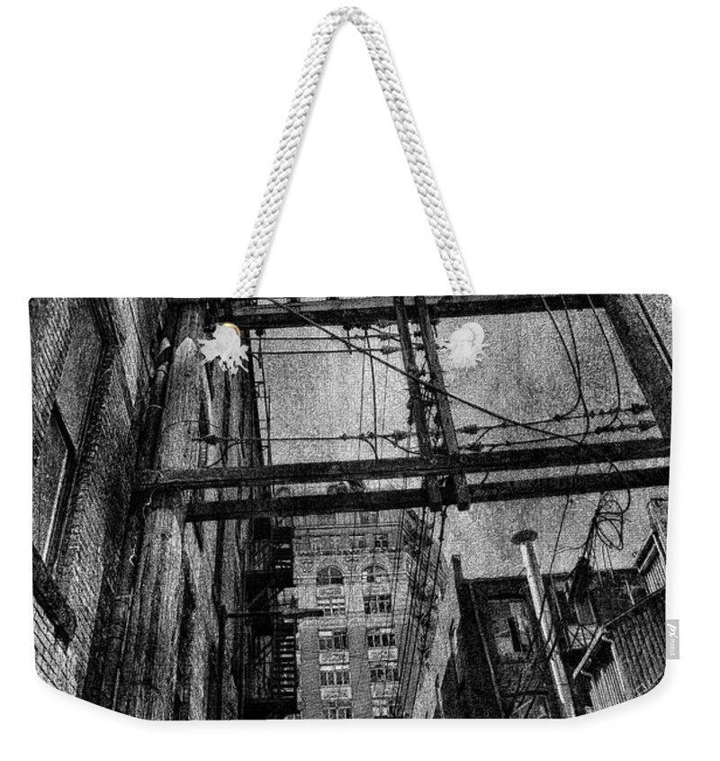 Theresa Tahara Weekender Tote Bag featuring the photograph There Once Was A City by Theresa Tahara