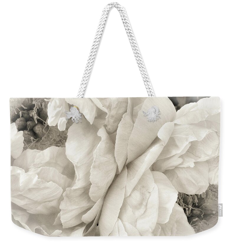 Sepia Weekender Tote Bag featuring the photograph These Flowers Will Never Fade by Lynn Wohlers