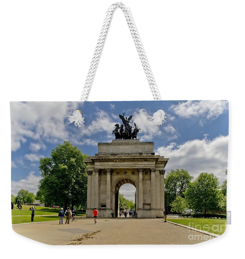London Weekender Tote Bag featuring the photograph This is London. Wellington Arch. by Elena Perelman