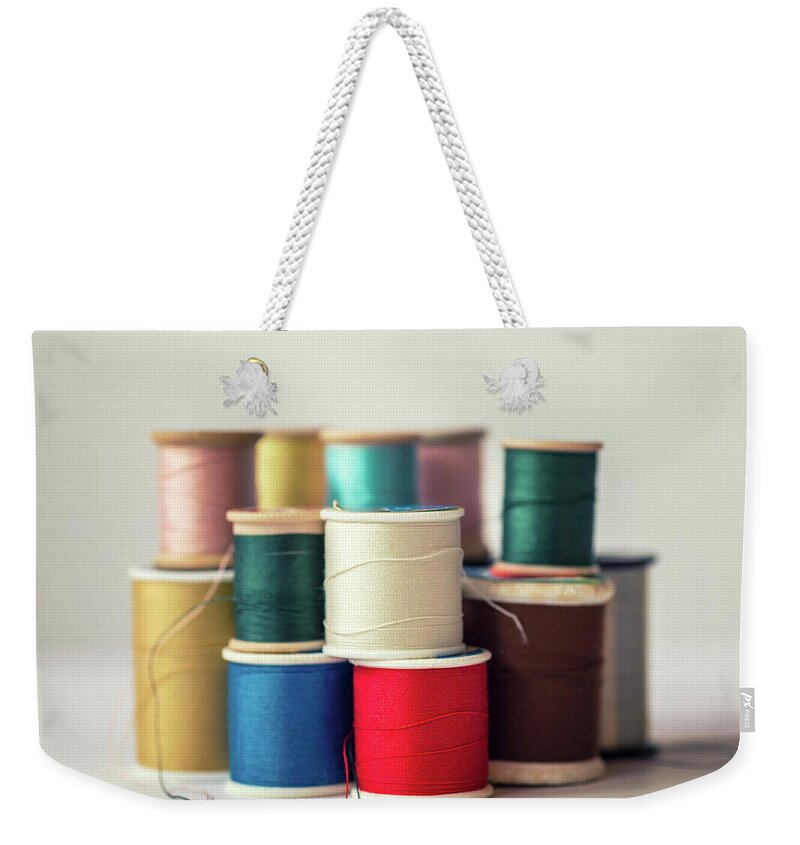 Sewing Thread Weekender Tote Bag featuring the photograph Thread #1 by Joseph S Giacalone