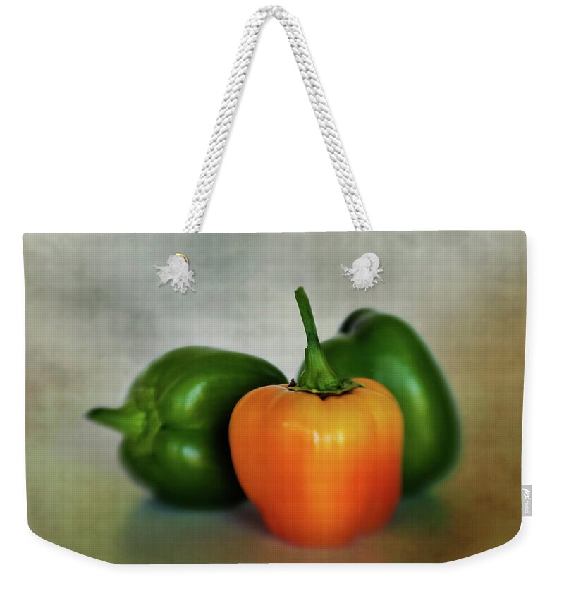 Agriculture Weekender Tote Bag featuring the photograph Three Bell Peppers by David and Carol Kelly