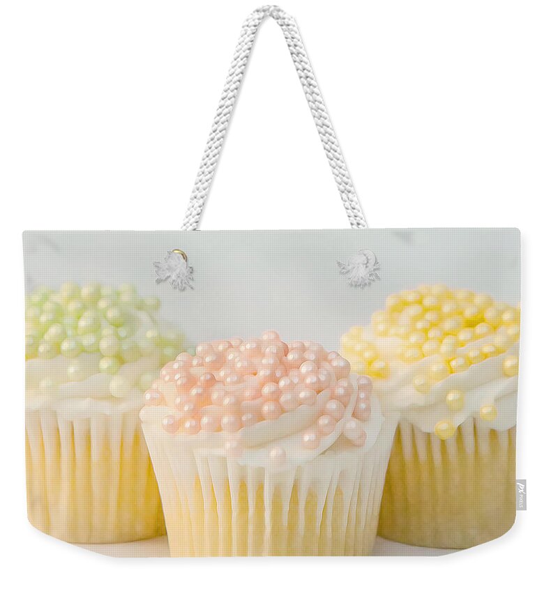 Cupcakes Weekender Tote Bag featuring the photograph Three Cupcakes by Art Block Collections