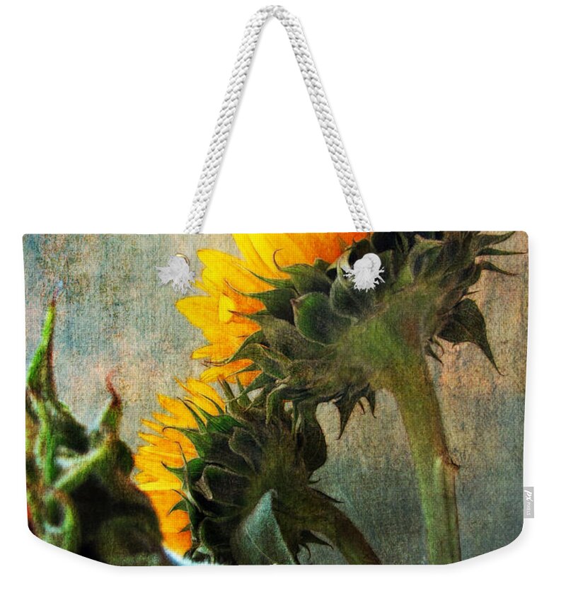 Sunflowers Weekender Tote Bag featuring the photograph Three by John Rivera
