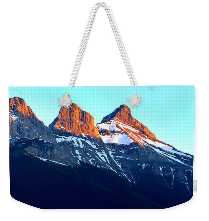 Three Sisters Weekender Tote Bag featuring the photograph Three Sisters Sunset by Adam Jewell
