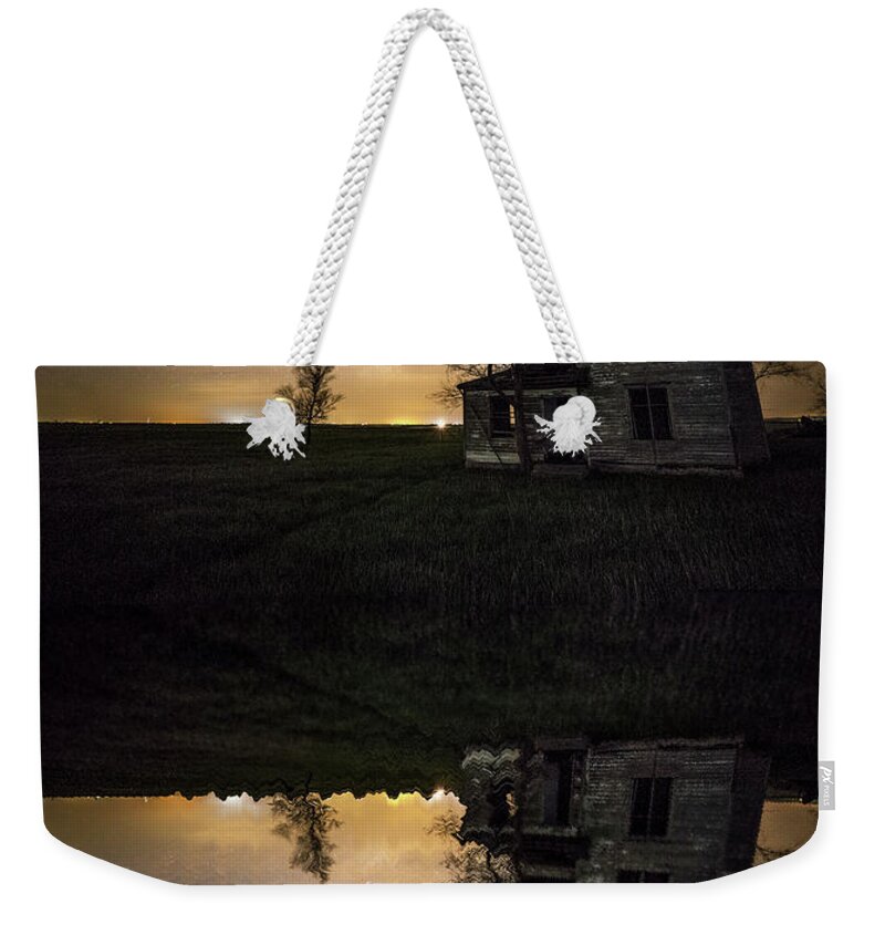 Sky Weekender Tote Bag featuring the photograph Through a mirror darkly by Aaron J Groen