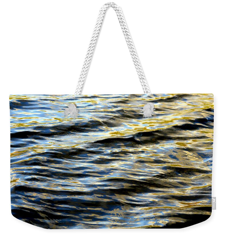 Water Weekender Tote Bag featuring the photograph Through Darkness Came Light by Donna Blackhall