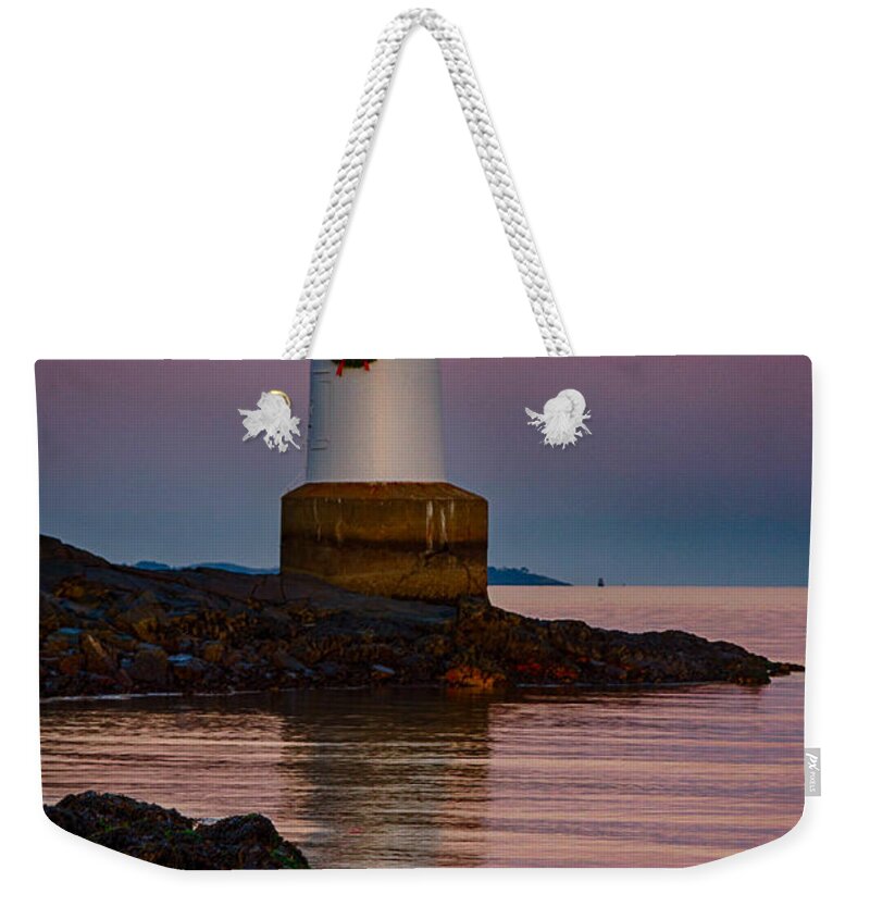 Salem Weekender Tote Bag featuring the photograph Tide coming in at Winter Island Lighthouse by Jeff Folger