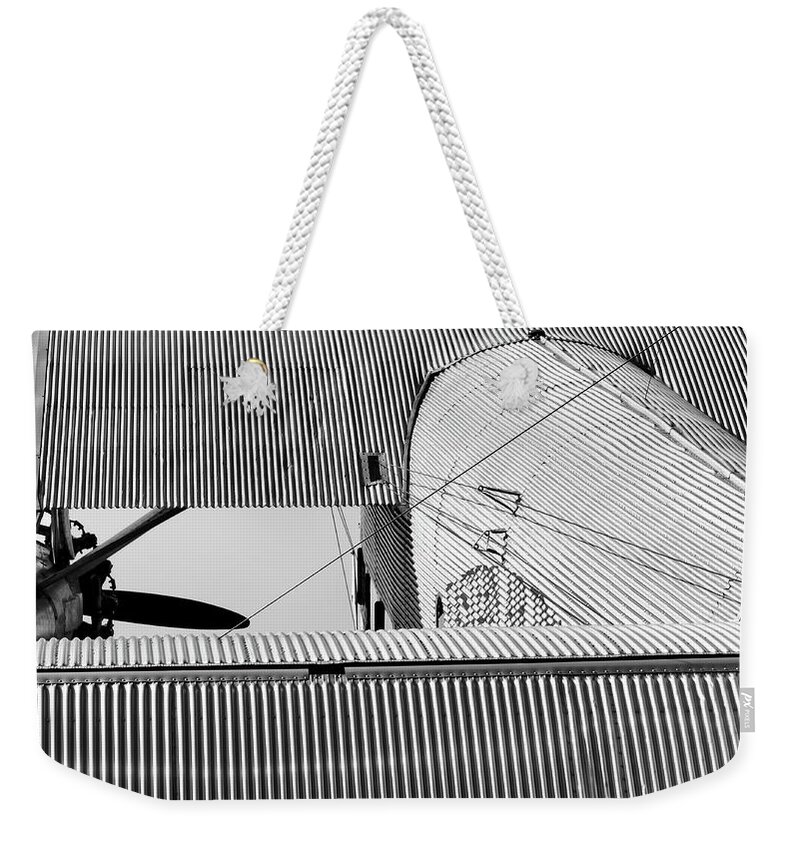 2012 Weekender Tote Bag featuring the photograph Tin Drag by Chris Buff