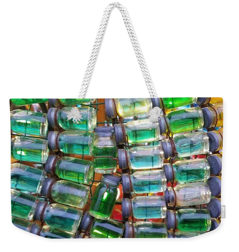 Colors Weekender Tote Bag featuring the photograph Tiny Glass Jars by Britten Adams