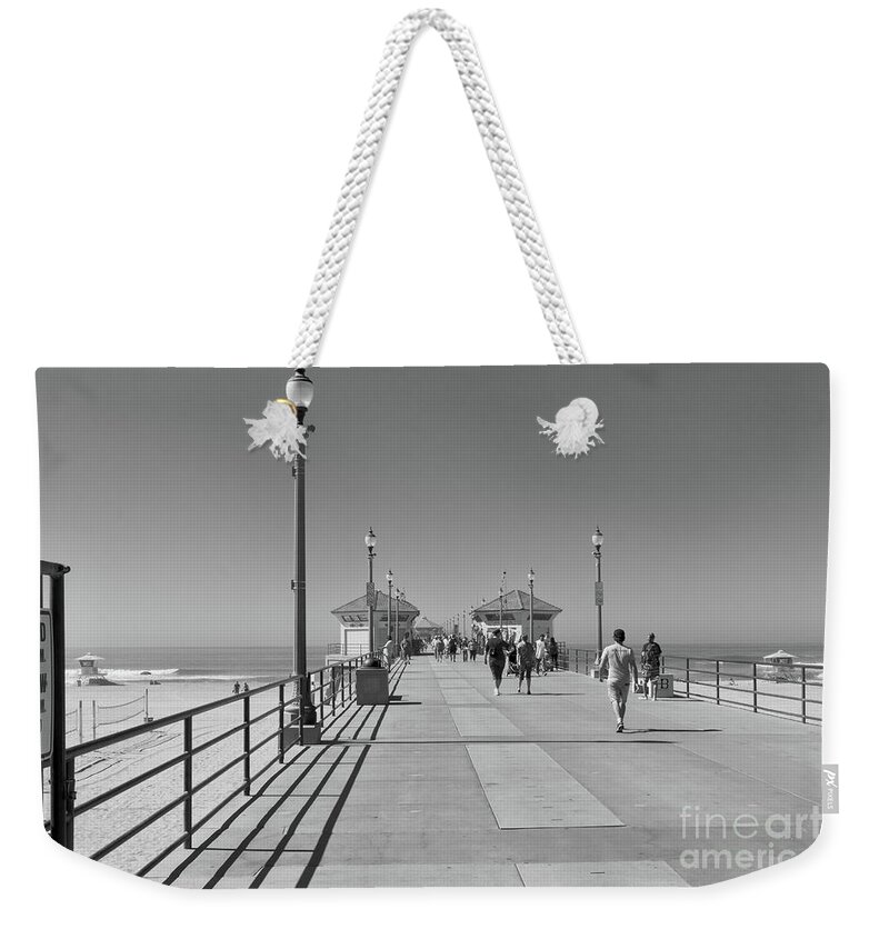 Huntington Beach Weekender Tote Bag featuring the photograph To The Sea on Huntington Beach Pier by Ana V Ramirez