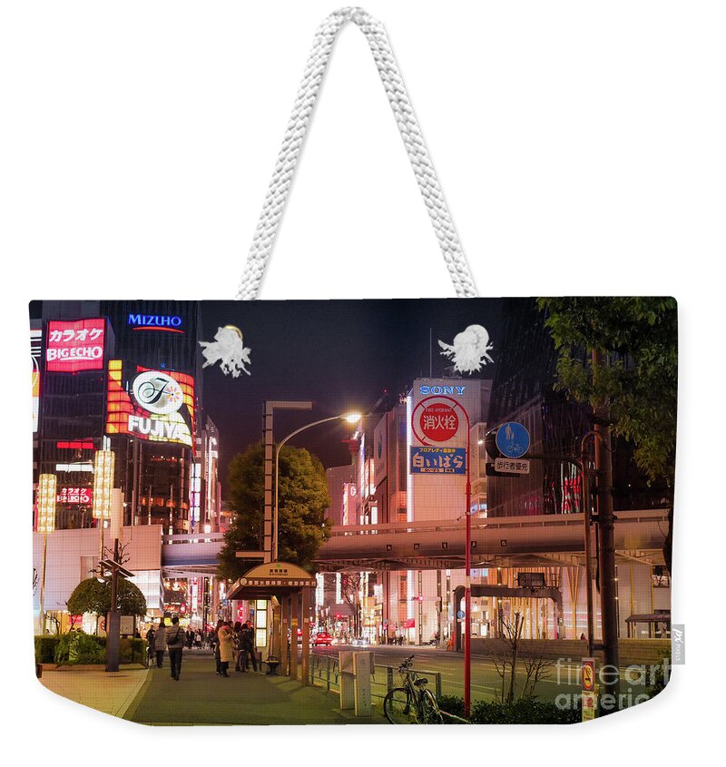 Pedestrians Weekender Tote Bag featuring the photograph Tokyo Streets, Japan by Perry Rodriguez