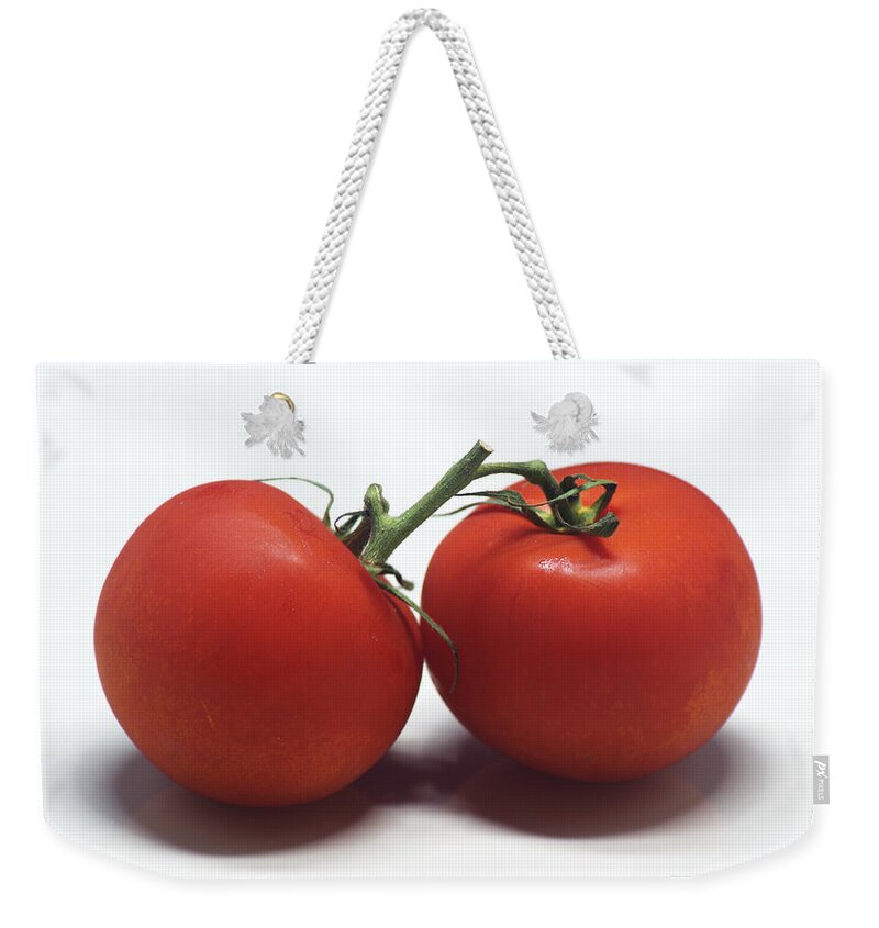 Tomato Weekender Tote Bag featuring the photograph Tomatoes by Chris Day