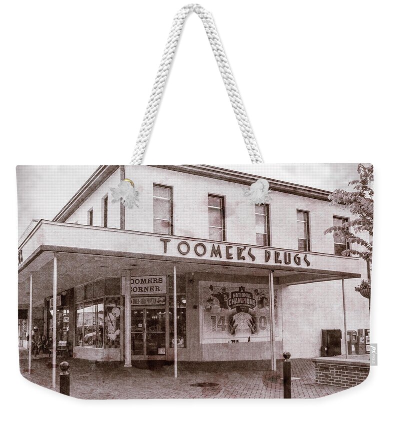 Auburn Weekender Tote Bag featuring the photograph Toomer's Corner - #3 by Stephen Stookey