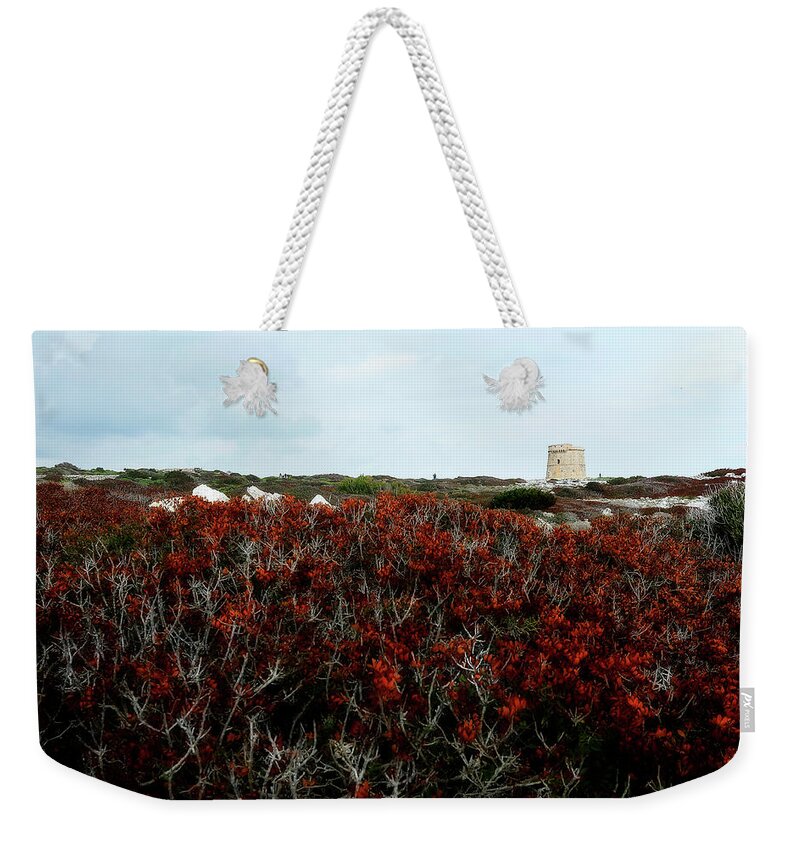  Weekender Tote Bag featuring the photograph Tower in red landscape by Pedro Cardona Llambias