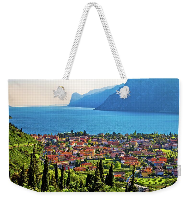 Torbole Weekender Tote Bag featuring the photograph Town of Torbole and Lago di Garda view by Brch Photography