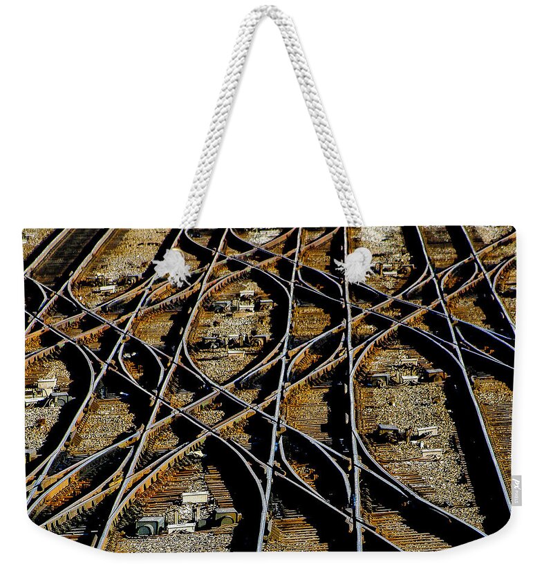 Abstract Weekender Tote Bag featuring the photograph Tracks of Abandon by Michael Nowotny