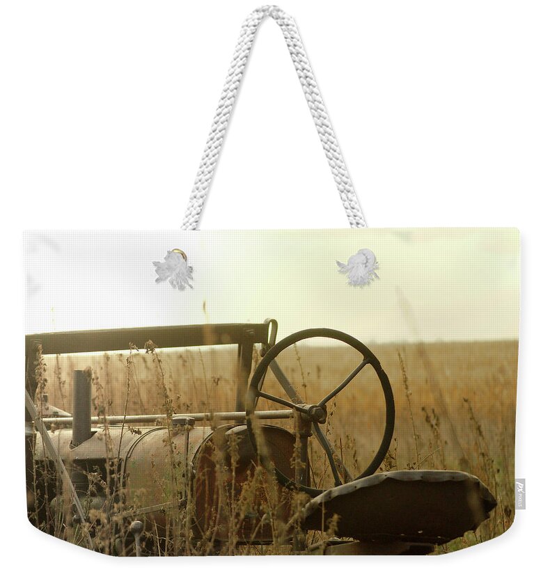 Tractor Weekender Tote Bag featuring the photograph Tractor Sunrise by Troy Stapek