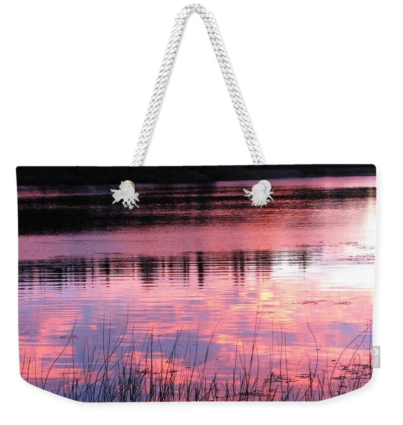 Alaska Weekender Tote Bag featuring the photograph Tranquil Canoe In Sunset by Anthony Trillo