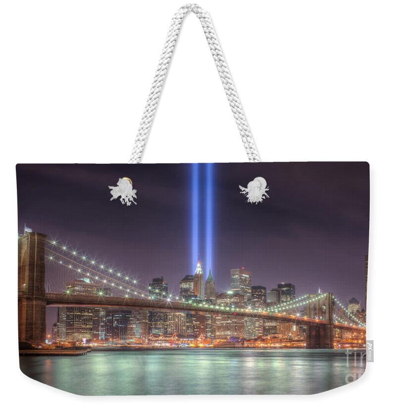Clarence Holmes Weekender Tote Bag featuring the photograph Tribute in Light III by Clarence Holmes