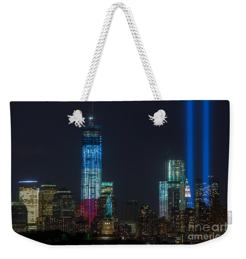 Clarence Holmes Weekender Tote Bag featuring the photograph Tribute in Light VII by Clarence Holmes