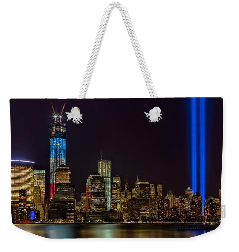 Tribute In Lights Weekender Tote Bag featuring the photograph Tribute In Lights Memorial by Susan Candelario