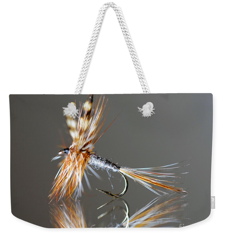 Fly Weekender Tote Bag featuring the photograph Trout fly 2 by Glenn Gordon