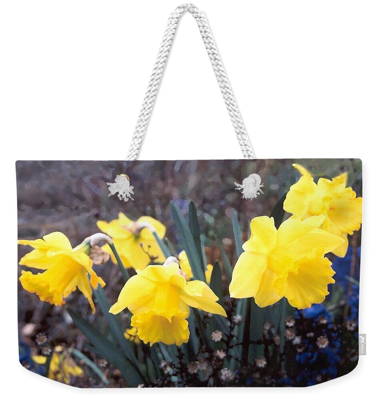 Flowes Weekender Tote Bag featuring the photograph Trumpets of Spring by Steve Karol