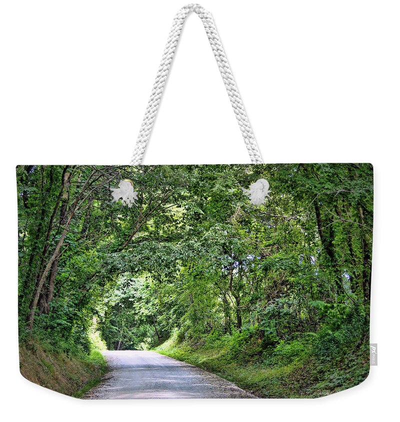 Tree Weekender Tote Bag featuring the photograph Tunnel of Trees by Cricket Hackmann