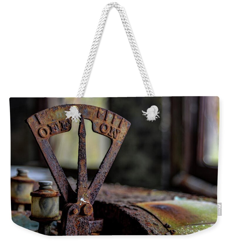  Weekender Tote Bag featuring the photograph Turned On by Jim Figgins