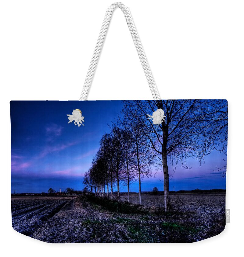 Countryscape Weekender Tote Bag featuring the photograph Twilight and trees by Roberto Pagani