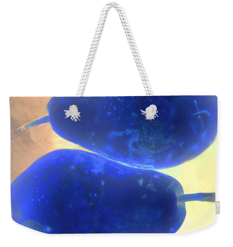 Pear Pair Fruit Stem Skin Flesh Blue Yellow Orange Peach Above Below Weekender Tote Bag featuring the photograph Two Blue Pears on Peach Stacked by Heather Kirk